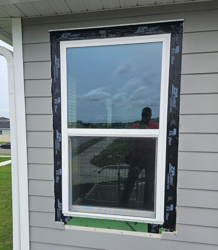 New window just installed showing how it is waterproofed and insulated.
